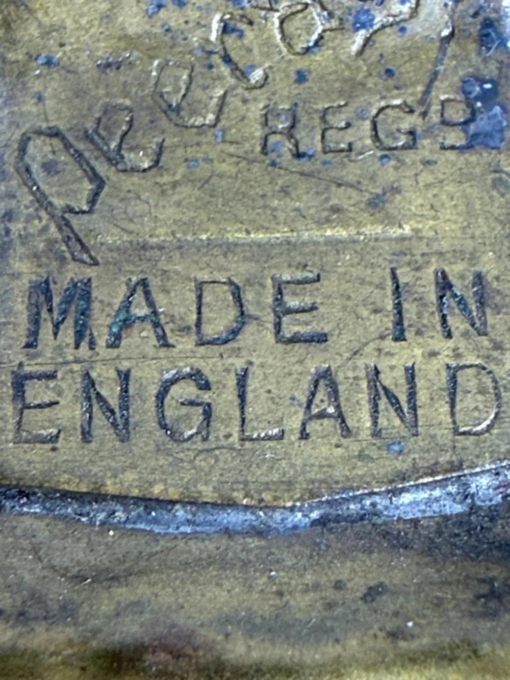Decorative Embossed Brass Wall Plate with Spinning Wheel Motif
